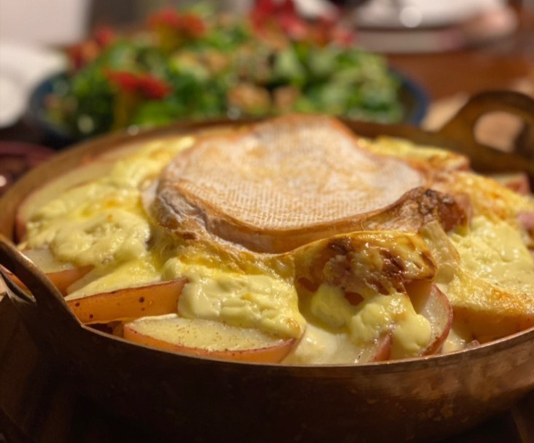 slices of potato topped with round melted cheese